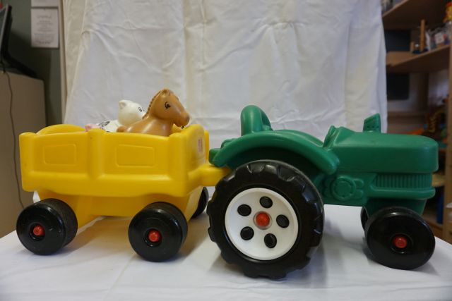 Tractor met aanhanger met dieren